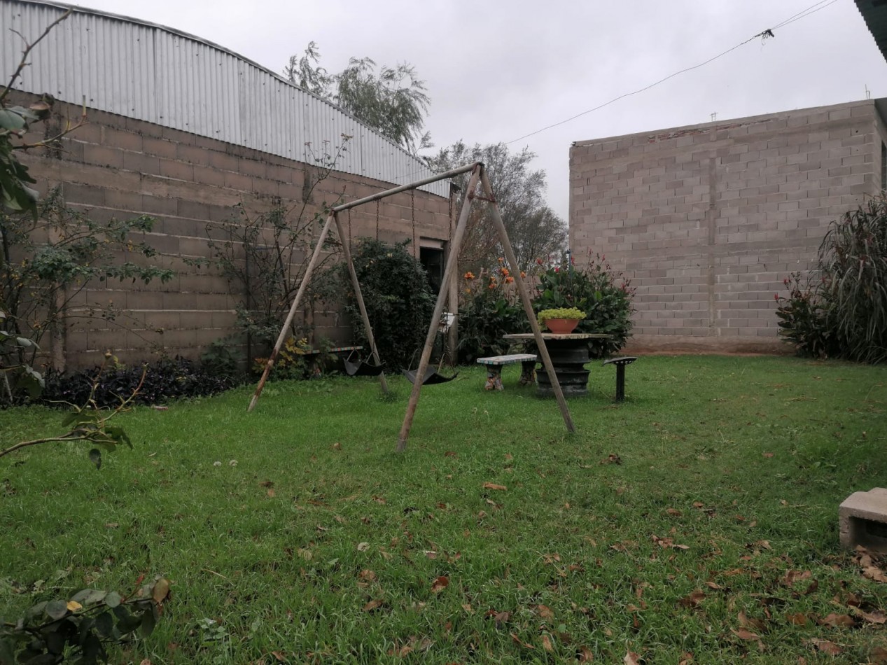 VENDO CASA CON GALPON - LABORDE CBA.-