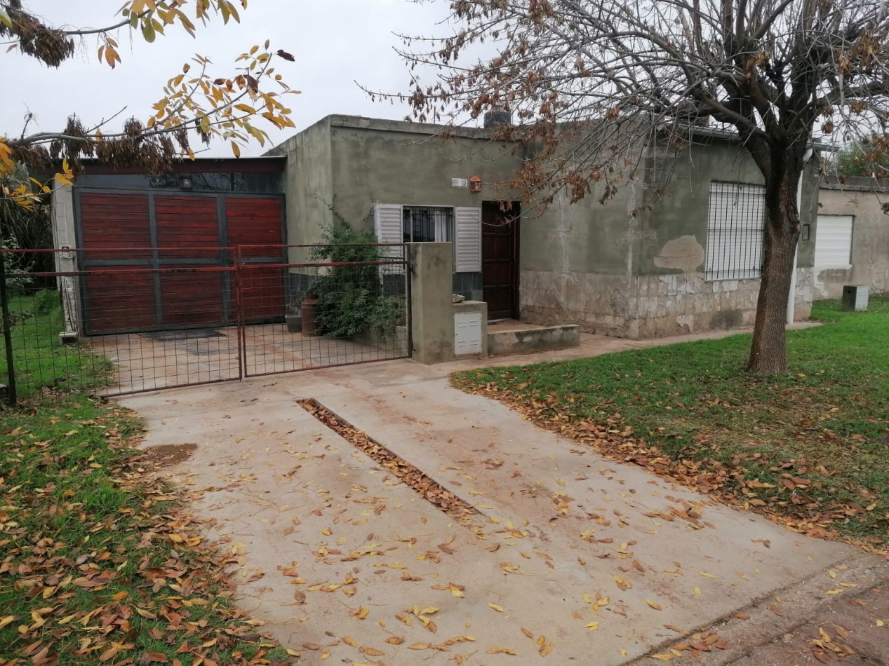 VENDO CASA CON GALPON - LABORDE CBA.-
